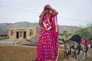 Woman and her newly acquired Goat