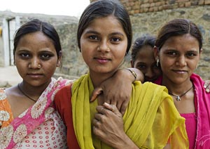 girls gather outside a self-help group meeting in Bagad-Rajput